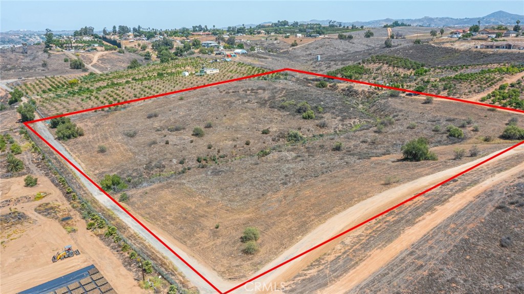 10-Acre Agricultural Parcel For Sale-Prime Riverside County Location.
Don't miss this rare opportunity to own10 usable acres in the highly desirable agricutural area of Riverside County, ideally situated near major streets, El Sobrante Road, Van Bueren Boulevard, and Mockingbird Canyon. This expansive parcel offers a peaceful rural setting with easy access to city amenities.
Zoned for agricultural use, the property is perfect for a nursery, grove, vineyard, or other outdoor planting operations. With plenty of open space and excellent sun exposure, it provides an ideal environment for cultivation or hobby farming.
Water service is available on-site (currently turned off), and a well was previously in place, offering potential to further support agricultural needs. Whether you're looking to expand an existing agricultural or start a new one, this property combines great location, functionality, and future potential. Bring your vision and explore the possibilities this exceptional parcel has to offer!