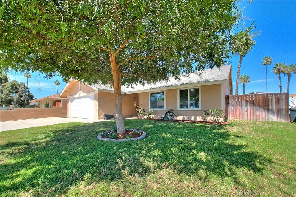 Welcome to 9539 Hermitage Lane, Riverside, CA - a beautifully upgraded move-in ready home tucked away on a quiet cul-de-sac. Conveniently located near shopping, dining, and with easy access to the 91 Freeway at Van Buren, this home offers both comfort and convenience. You'll enjoy fresh interior and exterior paint, new carpet in the master bedroom, tile flooring in living and high traffic areas, LED lighting, and ceiling fans in the living room and bedrooms. Features include premium custom closet storage, an EcoBee smart thermostat, and a Rachio smart sprinkler system. The kitchen boasts gorgeous wood cabinetry, granite countertops, a deep farmhouse sink and stainless steel LG smart appliances, including a convection oven and matching dishwasher. Additional upgrades include a newer roof, newer water heater, fully insulated garage, two solar attic fans, backyard stone pavers, and fruit trees (plum, guava, pomegranate, avocado). A true Riverside gem, ready for its next owner!