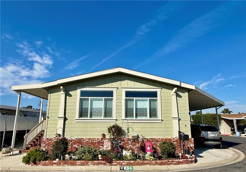 Photo of 18601 Newland Street #4, Huntington Beach, CA 92646 (MLS # OC26210481)