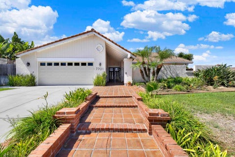 Photo of 7701 Garboso Pl PL, Carlsbad, CA 92009 (MLS # PTP2606793)