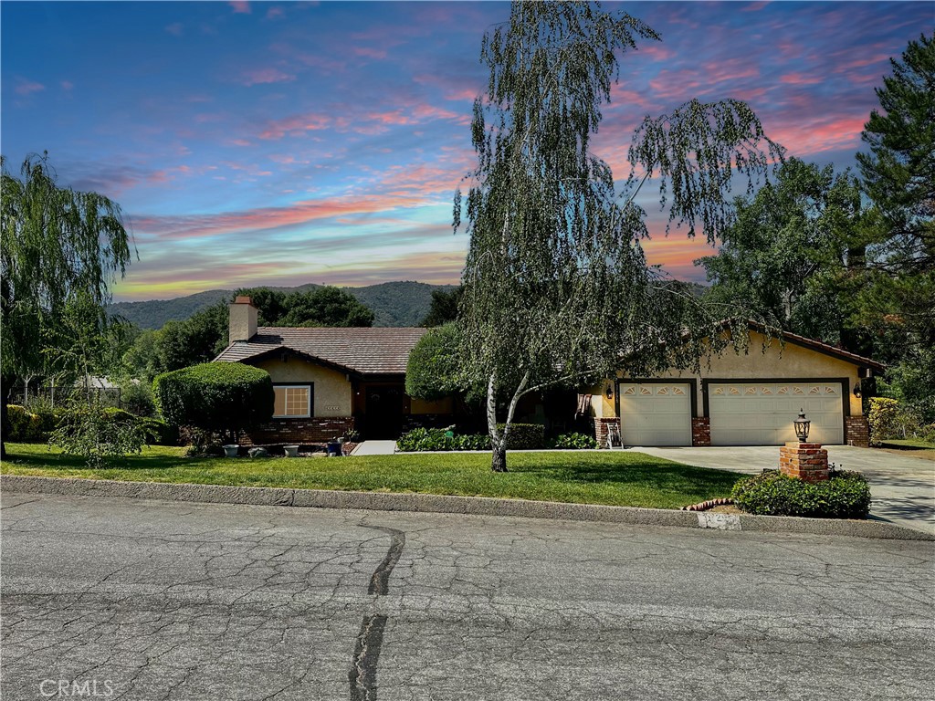Located in the heart of Hidden Meadows, this spacious 4-bedroom, 4-bathroom home offers 4,430 sq ft of living space on a beautifully landscaped half-acre lot. The property features fruit trees and a serene brook running through the backyard, creating a lush, park-like setting—ideal for those seeking tranquility in this sought-after area.
The home includes original wood flooring throughout, with upgraded wood floors in the master suite. Designed as a split-level, you'll enter on the second floor, with stairs leading down to the main living area. This flexible layout offers great potential, including the option to convert part of the home into an ADU (Accessory Dwelling Unit). SOLAR panels are paid off, new windows and sliders installed 2016, Indoor laundry,
The main kitchen has been updated with a new island, and the home includes both a formal dining room and a separate breakfast area—perfect for entertaining or accommodating multi-generational living. High vaulted ceilings enhance the open floor plan, offering the airy, spacious feel that's come to define homes in Hidden Meadows.