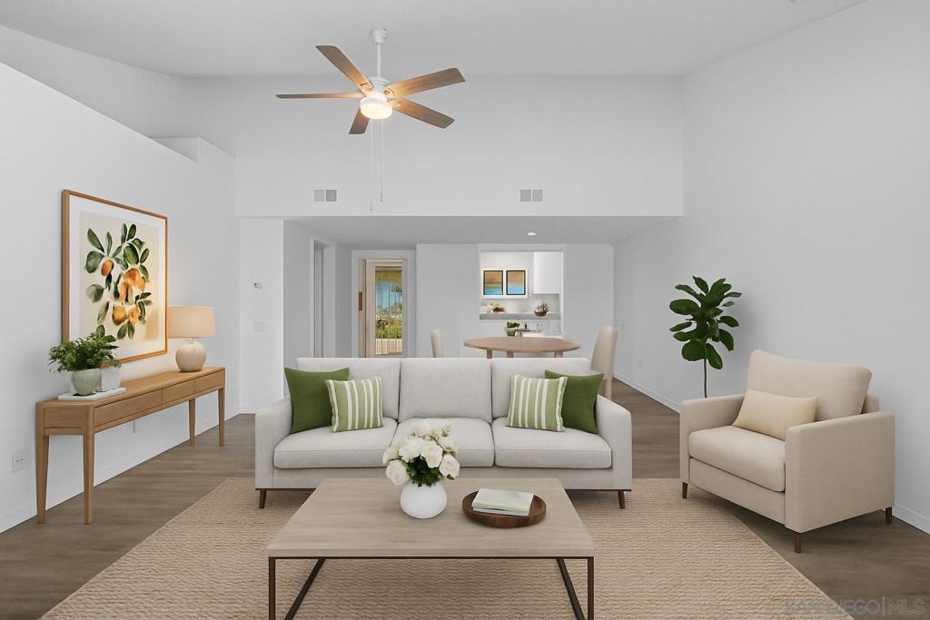 SINGLE-STORY LIVING IN OCEANA 55+! This updated 2-bedroom, 2-bathroom home offers 1,170 sq. ft. of comfortable single-level living in the desirable Oceana community. The open floor plan features high ceilings, new vinyl flooring throughout (2021), and an enclosed lanai with walls of windows that create a bright additional living space—ideal as a sunroom, office, or hobby area. The kitchen was remodeled in 2008 with clean white cabinetry, and both bathrooms have been tastefully updated. Convenient indoor laundry with a stackable washer and dryer is included. Major upgrades provide peace of mind, including a new roof (2024), upgraded electrical subpanel (2009), tankless water heater (2007), and furnace/AC relocated to the attic (2007) for improved efficiency and storage space. A detached one-car garage with automatic door adds everyday convenience. Residents of Oceana enjoy a vibrant 55+ lifestyle with a pool, spa, clubhouse, and community events—all just minutes from shopping, dining, golf, and the beach. Move-in ready and low-maintenance, this home is perfect for easy coastal living!