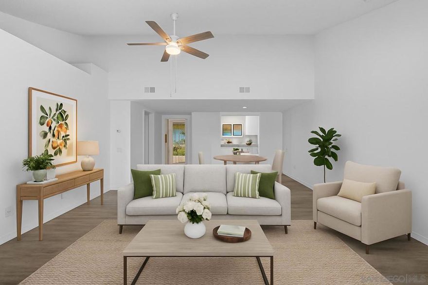 SINGLE-STORY LIVING IN OCEANA 55+! This updated 2-bedroom, 2-bathroom home offers 1,170 sq. ft. of comfortable single-level living in the desirable Oceana community. The open floor plan features high ceilings, new vinyl flooring throughout (2021), and an enclosed lanai with walls of windows that create a bright additional living space—ideal as a sunroom, office, or hobby area.  The kitchen was remodeled in 2008 with clean white cabinetry, and both bathrooms have been tastefully updated. Convenient indoor laundry with a stackable washer and dryer is included. Major upgrades provide peace of mind, including a new roof (2024), upgraded electrical subpanel (2009), tankless water heater (2007), and furnace/AC relocated to the attic (2007) for improved efficiency and storage space.  A detached one-car garage with automatic door adds everyday convenience. Residents of Oceana enjoy a vibrant 55+ lifestyle with a pool, spa, clubhouse, and community events—all just minutes from shopping, dining, golf, and the beach.  Move-in ready and low-maintenance, this home is perfect for easy coastal living!