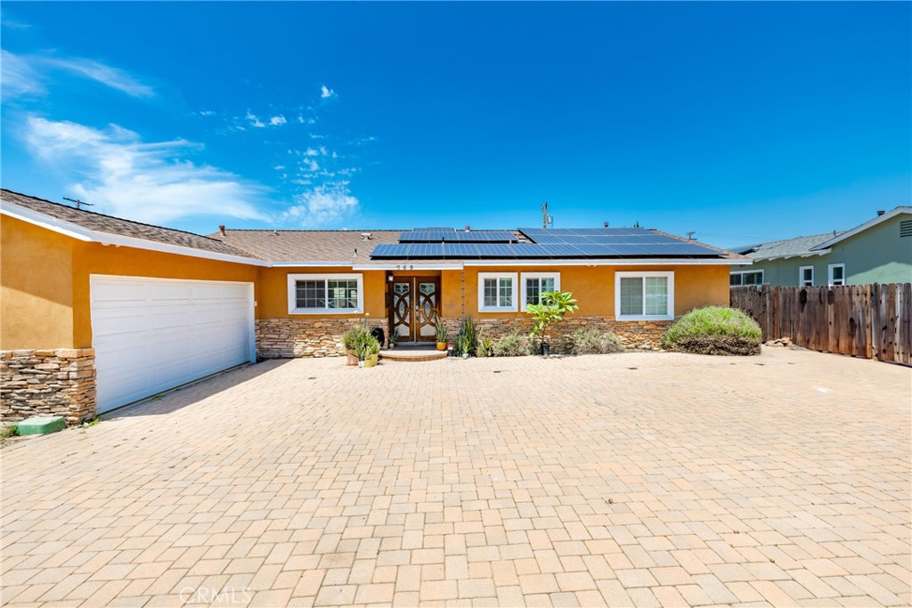 Welcome to your dream home in one of Covina’s most desirable communities! This beautifully updated 3-bedroom, 2-bathroom residence offers the perfect blend of comfort, style, and convenience. Step inside to find an open and inviting floor plan with laminate flooring throughout and an upgraded kitchen featuring sleek quartz countertops, a large stainless steel sink, large island, and modern finishes. The open floor plan is ideal for both daily living and entertaining. All of the bedrooms are oversized and have large closets. There also an addition space for an office, or den with French doors leading to the back yard. Staying cool in the summer won't be an issue, all of the window were updated to brand-new energy-efficient windows, new AC, and a massive solar system helps keep your utility bills low. Outside enjoy your own private oasis with a sparkling pool, perfect for those warm California days, or enjoying some great barbeque under the covered patio. The driveway is huge and has tons of parking for the RV, and all of the toys. This home is located just minutes from the freeway and surrounded by top-rated shopping, dining, and entertainment, Briarwood truly has it all truly has it all. Don’t miss the chance to live in a fantastic neighborhood with everything you need right at your fingertips!
