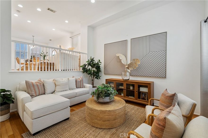 This detached Harbor City townhome is a true standout, with abundant natural light, modern upgrades, and a split-level design that feels both spacious and inviting. The light-filled 3-bedroom, 2.5-bath home offers soaring ceilings and tall windows that flood the living spaces with natural light. Hardwood floors flow through the main living areas, while the open kitchen with a center island and stainless steel appliances, including a built-in microwave, dishwasher, and stove, connects seamlessly to the dining room and a seating area, creating an ideal space for entertaining.

Upstairs, all three bedrooms are finished with carpeting. The remodeled primary suite boasts a hotel-like bath with a tiled shower, marble vanity with an LED mirror, and a custom walk-in closet with built-in drawers and shelves. Guest bathrooms include a full bath with a quartz vanity and LED mirror, while a powder room serves the main level.

A private patio offers the perfect spot for outdoor dining and BBQs, while a secured front courtyard enhances the sense of privacy. Additional highlights include central AC and heat, a washer and dryer in the garage, and a two-car garage with direct access. Enjoy low HOA and secured access, as well! This home offers all the modern amenities you need with easy access to freeways, Kaiser’s hospital, Palos Verdes, and the beach cities and moment’s from Ken Malloy Park, putting the best of the South Bay right at your doorstep.