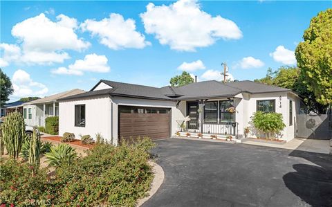 Photo of 6714 Mclennan Ave, Lake Balboa, CA 91406 (MLS # TR25241608)