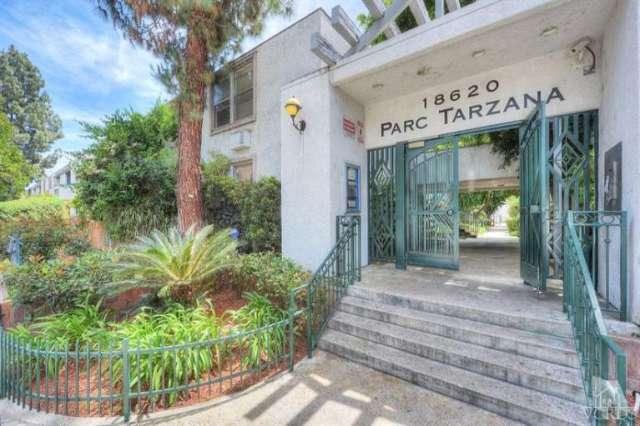 This spacious lower level Parc Tarzana 2-bedroom and two full bath condo features an open kitchen with tile countertops and backsplash, stainless steel sink, and breakfast bar, granite countertops in the bathroom, and ample storage space throughout. This home also features stunning wood floors, new carpeting, mirrored closet doors, spacious bedrooms, and a private outdoor patio area with access to the common grounds. The master bedroom boasts 2 closets (one walk-in closet), and an attached bathroom. The Parc Tarzana community is in a wonderful location convenient to shopping with easy freeway access. Make it your home today!