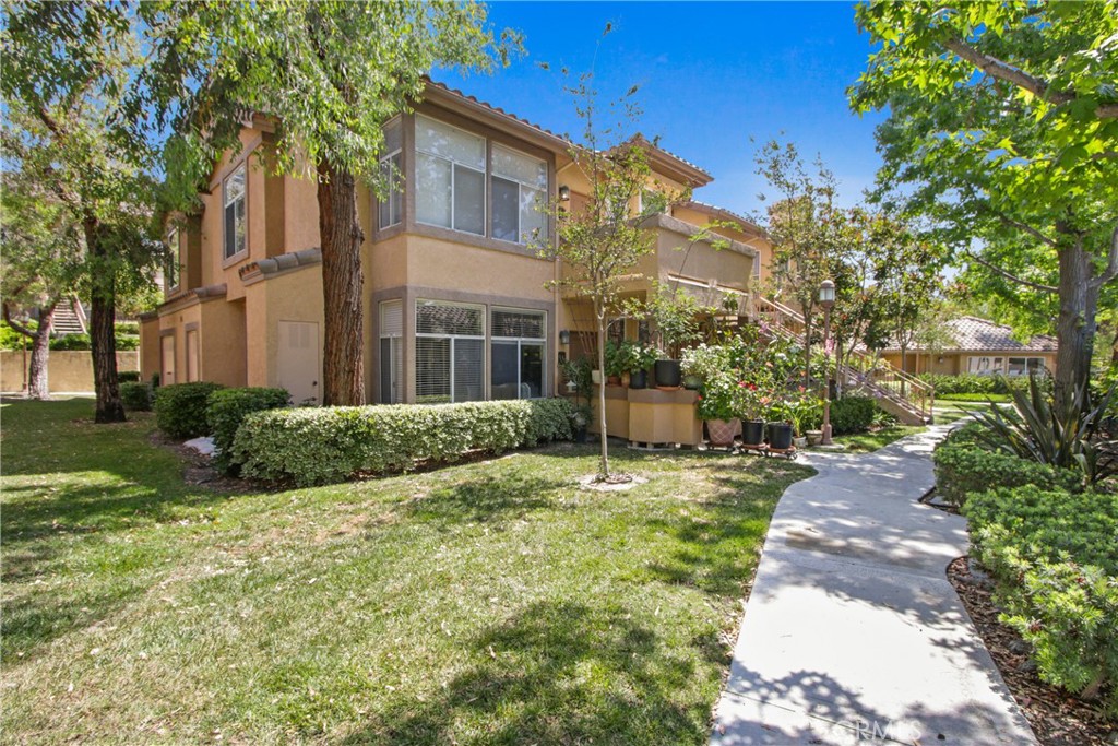 Welcome to this beautifully upgraded single-story condominium situated on the second floor in the highly desirable Tuscany community. With 1,060 sq ft of stylish living space, this home features elegant warm laminate flooring throughout, a remodeled kitchen, and both bedrooms equipped with modern mirrored wardrobes.
Enjoy the outdoors on your expansive patio, perfectly designed for relaxed mornings or lively BBQ gatherings. Tuscany offers resort-style amenities that cater to every lifestyle, including two pools, two spas, a clubhouse, a recreation room, tennis courts, and a putting green. Plus, you'll appreciate the convenience of a 24-hour equipped gym, a car wash station, and ample guest parking—all without any Mello Roos fees.
Situated in a prime location near the 241 toll roads and shopping centers, this move-in-ready condo is part of the Foothill Ranch Homeowner Association, which provides even more exceptional amenities.