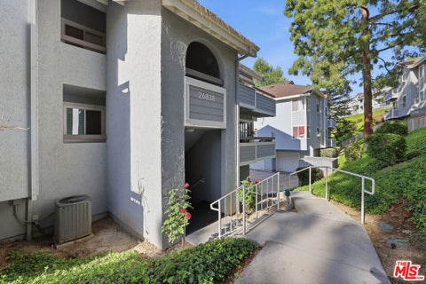 Photo of 26838 Claudette Street #227, Canyon Country, CA 91351 (MLS # 26866723)