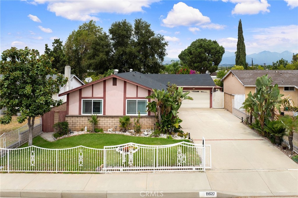 Situated on a Premier Lot in one of Rowland Heights’ most desirable neighborhoods, this charming single-story south-facing home offers the perfect balance of convenience and tranquility. The gated front yard with an extended driveway, providing both privacy and convenience.
Steps through the front door and enjoy all this outstanding home has to offer. Bright and airy open floor plan, and an expansive living area perfect for gatherings. This wonderful home offers Newly AC system /Upgraded laminate flooring /Dual-pane windows / Remodeled kitchen & bathrooms and so much more to offer.
The private backyard features a charming covered patio, artificial turf, hardscaping, variety of fruit trees and stunning mountain views. perfect for relaxing or entertaining. With its excellent orientation, open layout, and prime location walk distance to top-rated schools(K-12), parks, shopping, dining, doctors and church. Super FWY access. RARE to find such a great home combines comfort, beauty, and lifestyle in one perfect package! Must See!