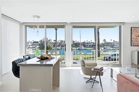 Photo of 383 Bay Shore Ave #203, Long Beach, CA 90803 (MLS # DW26056079)