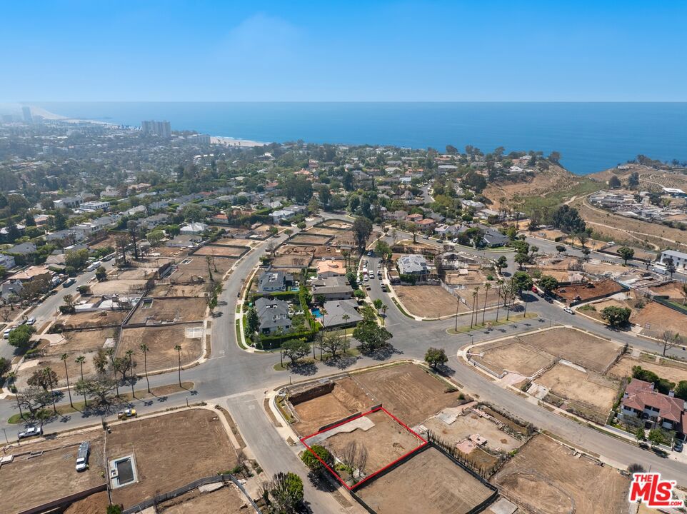 Prime opportunity in the heart of Pacific Palisades! Located in the prestigious Huntington Palisades, this rare, flat 8,023 SQ FT vacant lot, cleared and ready for construction by the Army Corps of Engineers, offers a blank canvas for building a custom dream home in one of Los Angeles' most sought after coastal neighborhoods. Formerly home to a 3,612 SQ FT, 5-bedroom, 3.5-bath residence, the property is ideally situated just moments from the Palisades Village, top rated schools, scenic hiking trails, and world class beaches. Whether you're an end user, builder, or investor, this is a unique chance to create a legacy residence in an ultra-prime Westside location.