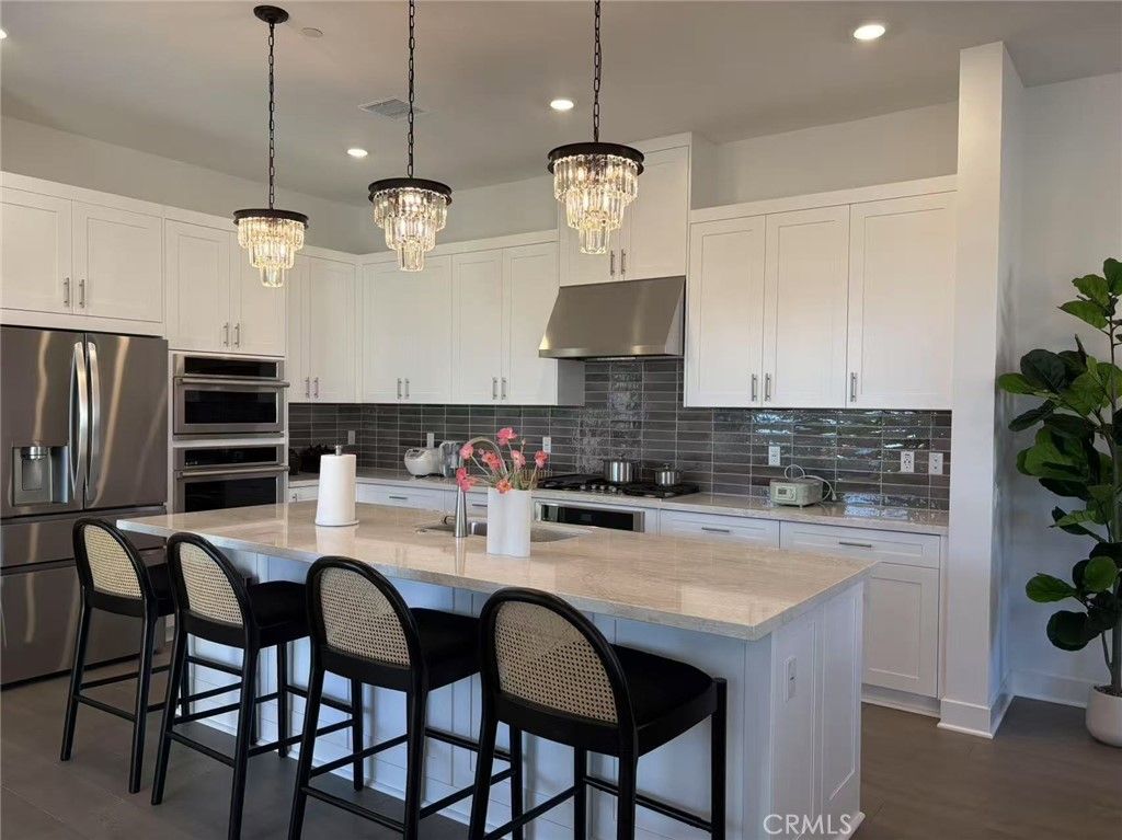 Photo of 313 Terrapin, Irvine, CA 92618 (MLS # OC26017382)