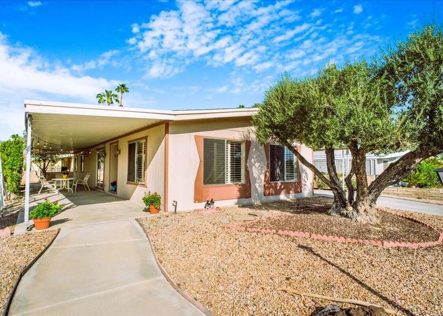 Checks All The Boxes! :55+Gated Golf Course Community-Great Price!-Move-in-Ready!:Low HOA Fee!-Walk to Remodeled Clubhouse!-Pickleball,Bocce,Pub,Cards,& 3 pools!  This lovely 2Br,family room home is light & welcoming with a great Cul-de-sac location near the Clubhouse in Portola Country Club where you own your land. Enjoy the new 4-ton Central Air Conditioner & furnace that cools like a dream and is quiet as well. The living-room & formal dining area have plantation shutters.  The kitchen has a built-in dining island looking toward the family room & outdoor patio area.  Nice white gas appliances, double sink & light oak laminate flooring for easy care.  The family room has a wet bar, track lighting & built in bookshelves.  The extra large office/laundry room has plenty of storage & built in desk for your computer & printer.  The primary BR features an ensuite bath with separate shower & soaking tub & vanity with dual sinks.  The guest bath adjacent to the guestroom has a vinyl shower with built-in seating.  Dine ''Alfresco'' in your covered patio enclosed with slumpstone wall & Fiscus trees for privacy.  The area can also be a perfect play area for your canine pal with the addition of a gate.  The entire home is enclosed on three sides with nice slumpstone and there is parking for two cars & a golf cart under the covered carport that has entry access direct into the kitchen.  A large storage shed gives you room for your bikes, garden tools, etc.  Portola Country Club has only 500 homes ranging from the mid-200's to $500,000.  Come take a look at this great opportunity to live in such an exceptional 55+community in Palm Desert.