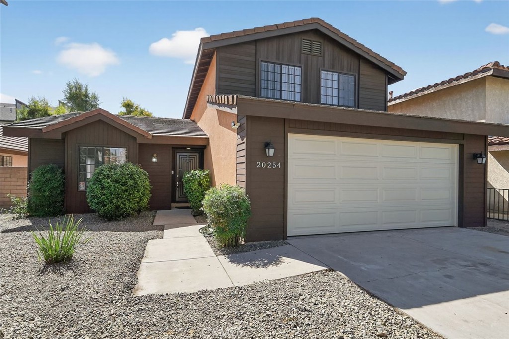 Newly updated 4 BR 3BA detached home. 1 BR 1BA downstairs for easy living. Master BR with shower and oversized whirlpool. New kitchen appliances, big pantry, eating area in kitchen with bay window. Hardwood floors and tiles throughout on main level. Brand new carpet in all bedrooms. Concrete tile roof. 2 car attached garage, nice back yard.