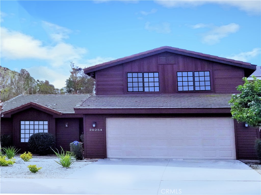 Newly updated 4 BR 3BA detached home. 1 BR 1BA downstairs for easy living. Master BR with shower and oversized whirlpool. New kitchen appliances, big pantry, eating area in kitchen with bay window. Hardwood floors and tiles throughout on main level. Concrete tile roof. 2 car attached garage, nice back yard.