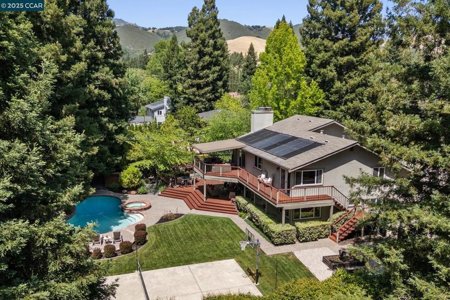 Welcome to this stunning property, now available at an incredible price of $2,795,000, reflecting a significant reduction of over $200,000! This beautiful home features 5 spacious bedrooms and 4 bathrooms, perfect for those looking for extra space.  As you explore, you’ll notice the added benefit of an Accessory Dwelling Unit (ADU), providing flexibility for guests, rental income, or a private office. The outdoor area is an entertainer's dream, complete with a sparkling pool & spa, outdoor kitchen, a sports court for your active lifestyle, and beautifully landscaped gardens that offer a serene escape.  Enjoy breathtaking mountain views that create a picturesque backdrop to your everyday life. This property truly combines luxury with practicality, making it a rare find in today’s market. Don’t miss your chance to own this incredible home! We will be open Sat & Sun for the month of October. Thank you for joining us, and feel free to ask any questions.