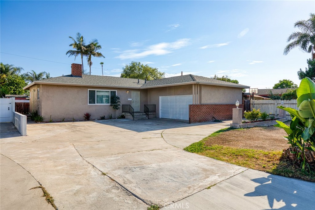 Single house in the city of Anaheim, near the corner of Brookhurst and Katella, this single-family residence boasts 3 bedrooms, 2 bathrooms, and an enclosed patio that can be utilized as a dining room or 4th bedroom. The living area spans approximately 1,290 Square feet, complemented by 2 detached garages and ample parking space for multiple vehicles, including RVs. The property sits on a generous lot of approximately 7,361 Square feet. The asking price is $949,999. This house is like a gem, is on the rough; you could turn it become a real deal and great place to live or to invest.