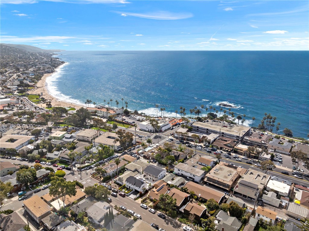 Stunning North Laguna property in coveted "Tree Streets" neighborhood. Total of six units including an elegant primary residence comprised of 3 bedrooms and two baths, great room, ocean views, patios, decks and professional landscaping. All new interiors. Attached to the SFR is a two level ocean view apartment which could be combined with the main residence. Then, at the rear of the property and accessed by Cedar Way, is the detached four-unit residential building. This structure is comprised of two 1-bedroom apartments and two large studio apartments. All new interiors also. Between the two property structures is a stunning garden & patio area providing a combination of entertainment and privacy for the environment. The primary residence has a two car garage and spacious driveway from Cypress. The rear structure offers two single garages, parking spaces, storage and large laundry room. Legal as a six-unit property, the options and opportunities are many for personal use and/or residential income. Located near Aster and Cypress, the site is ideal for strolling to downtown Laguna, Main Beach, Heisler Park and a multitude of restaurants, galleries and shops. This is a very special, landmark-style compound.