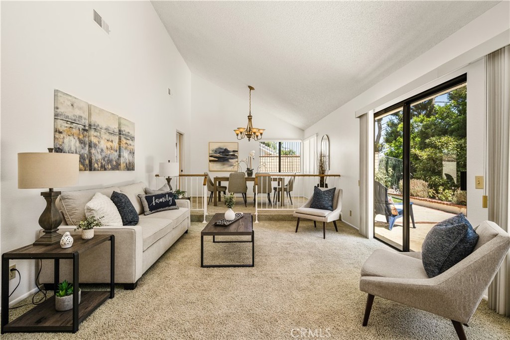 Welcome to one of the best little streets in Yorba Linda! This single story, semi-custom home is situated on a double cul-de-sac with 3 bedrooms and 2 baths and 1931 square feet of comfortable living space. Step inside to a bright living room with a cozy fireplace and vaulted ceiling, perfect for gatherings and relaxing evenings. The well designed kitchen includes a newer stove and a breakfast nook, ideal for casual dining, while the formal dining area provides space for hosting. The primary suite offers a private retreat with an oversized soaking tub, separate shower, and generous closet space. Step outside to a beautifully maintained backyard with mature fruit trees. The perfect spot to unwind or entertain. This home is a wonderful blend of comfort, style, and functionality.