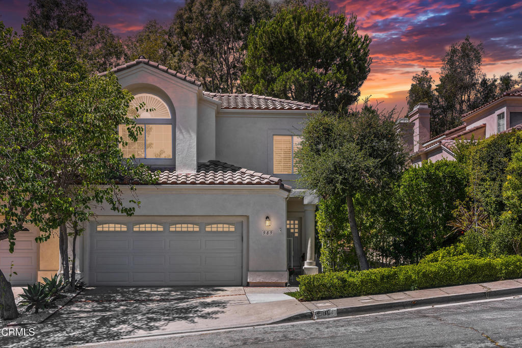 Experience the epitome of luxury resort-style living in Glendale with this nearly 2,500 square foot custom interior designed home, filled with ultra-premium finishes and set within the coveted Rancho San Rafael community. Nestled in the serene hills above Glendale, this exclusive enclave offers a resort-like lifestyle with exclusive access to two pools, spa, tennis courts, pickleball, basketball, playground, and a staffed clubhouse--all just minutes from the city's most desirable dining and shopping. Enter the home via a secure, gated walkway into a dramatic two-story living room, where north-facing light floods through walls of windows, illuminating the open-concept floor plan. Designed for both everyday comfort and grand entertaining, the seamless flow connects the living, dining, kitchen, and den to a spacious dining patio, perfect for any size gathering. At the heart of the home, the chef's kitchen showcases a full-height marble backsplash and wall, large quartz countered island with seating, anchored by elite appliances including Wolf, Sub-Zero, Bosch, and Samsung, plus an under-mounted sink with water filtration. The adjoining den features a remote-controlled gas fireplace, a wall-mounted LG TV, and abundant natural light. Completing the lower level are a luxury powder room, a dedicated laundry room with LG washer/dryer with utility sink, and a generous storage closet. Upstairs, a loft-style office overlooks the living room, while two secondary bedrooms share a spa-sized bath with upscale finishes. The primary suite is a true retreat, offering a sitting area with fireplace, large windows, and a lavish spa-inspired bath with double sink quartzite vanity, marble-detailed tile and glass shower, soaking tub, makeup station, and a custom dressing-room-sized closet. Additional upgrades in the home include hardwood floors throughout, plantation shutters, recessed lighting, Italian light fixtures in living areas, and a spacious two-car garage with built-in storage cabinetry. Located just minutes from Whole Foods, the much anticipated Erewhon, The Americana at Brand, and the fine dining of Brand Boulevard, as well as nearby Chevy Chase Country Club and Glendale Sports Complex, with easy access to Downtown Los Angeles, Silver Lake, and Pasadena via the 2, 134, & 210 freeways. This home offers an unmatched combination of premium luxury and convenience, making it a rare opportunity to embrace resort-style living in one of Glendale's most desirable neighborhoods.