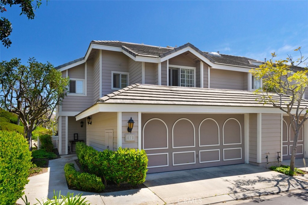 Located at the end of a tucked away cul de sac in the wonderful beach close community of Beacon Hill, this town home shows fresh, bright and private. Swiss Coffee walls white walls, an abundance of sunlight and upgraded vinyl wood plank flooring offer a great neutral palette for any decor. The renovated kitchen has custom cabinets, stainless steel appliances and granite counter tops. The spacious adjoining dining area or family room opens to the back patio. Upstairs, the primary bedroom has a lovely deck, walk-in closet, and en-suite bath. The front bedroom has a separate bath and expansive closet. The main floor living room centers around a fireplace showcased by a beautifully redesigned surround with an updated classic marble look. This room opens up to the spacious private patio surrounded by trees, a great place to spend hours of quiet relaxing, outdoor dining and unwinding. A full two car garage has direct access to the home and hook-ups for a washer and dryer. An extra bonus is that the unit has been re-piped. The Beacon Hill community offers pools, spas, tennis courts and open space parks near excellent shopping, restaurants and award winning schools. Owner may consider small dog. The beautiful hills and parks of Laguna Niguel, the revitalized downtown Dana Point, the exciting newly imagined Dana Point Harbor, quaint and lively Laguna Beach and miles of beautiful beaches are all just minutes away. Please note:Some photos were taken when a former tenant, a designer, was still in residence. The floor plan lends itself to various options of design for dining and living areas.