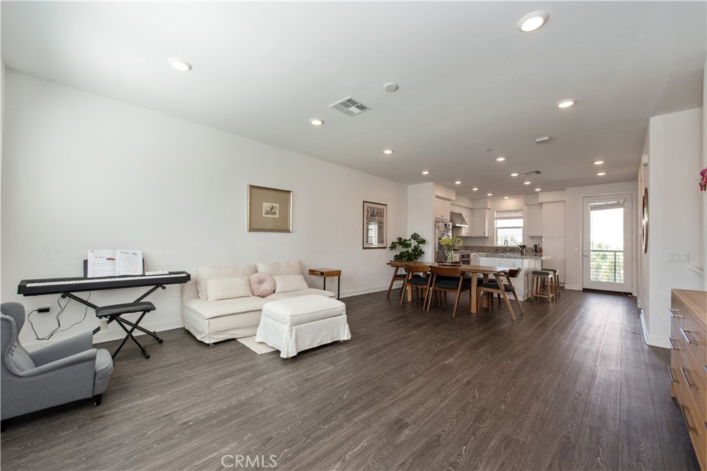 Completed in 2020, this modern Arieta residence sits in the heart of Serrano Summit, just steps from the community’s impressive clubhouse. The bright, open layout spans 3 bedrooms and 3.5 baths, including a full bedroom and bath on the main level. The second floor showcases a spacious great room with living and dining areas, a sleek contemporary kitchen, and a convenient powder room—ideal for gatherings. Upstairs, two private bedroom suites each offer their own bath for ultimate comfort and privacy.
Residents of Serrano Summit enjoy access to a resort-style recreation center with amenities such as a sparkling pool with sunset and city views, heated spa, pickleball and basketball courts, a stylish clubhouse, two parks with playgrounds, cabanas, BBQs, fire pits, and event spaces. Perfectly located near shopping, dining, and retail, with easy access to the 241 Toll Road, this home is an exceptional opportunity to make your own.