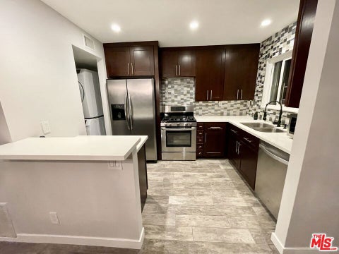 Photo of 10817 WHIPPLE Street #18, Toluca Lake, CA 91602 (MLS # 26864419)