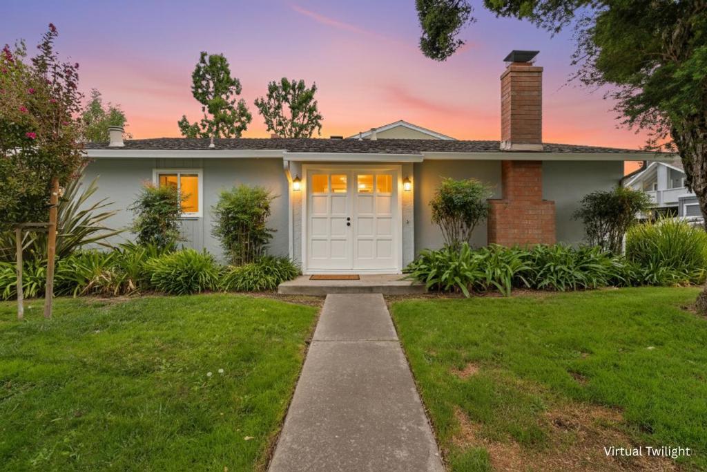 Experience Luxury, Great Amenities, and Stunning Park-Like Grounds! This isn't just a townhome; it's a premier lifestyle investment. The community boasts a stunning park-like setting with mature foliage, creating a peaceful and exclusive atmosphere. Enjoy the tranquility and majesty provided by several magnificent Redwood trees scattered throughout the grounds. Explore the property via beautifully maintained paths, perfect for evening strolls, morning jogs, or simply unwinding in nature. The exceptional community features ensure every day feels like a vacation. Host memorable events effortlessly in the spacious Community Room, which includes a large, dedicated kitchen. Enjoy two sparkling swimming pools for fitness and relaxation under the California sun. Sharpen your game with a tennis/pickleball court, plus a separate basketball court. Maintain your routine in the well-equipped community gym. Family Fun in a safe and engaging kiddie playground ensures entertainment for the youngest residents. This highly sought-after location provides a peaceful sanctuary while keeping you connected to the best of Silicon Valley. Don't miss this opportunity to acquire an unparalleled townhome in a community that seamlessly blends luxury living with a natural, resort-like environment.