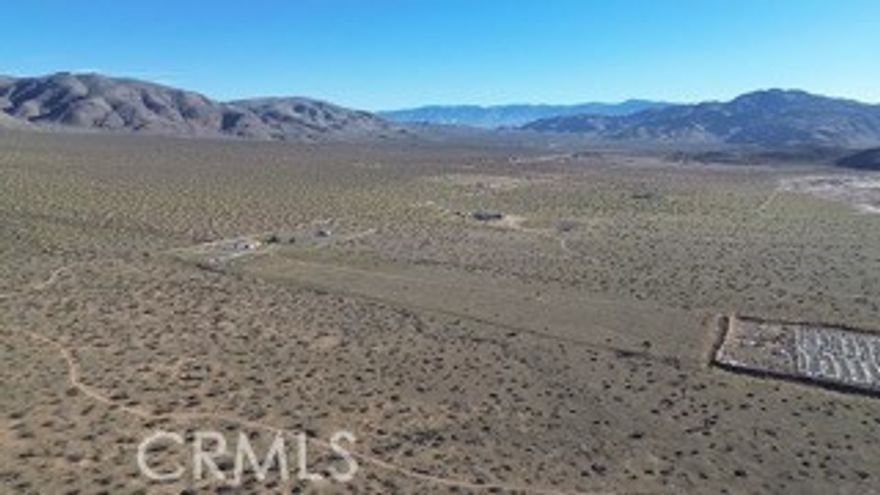 What more can you ask for when you have a very spacious 10 acre lot in Apple Valley? Clean air, open beautiful sky at night to see the stars, very peaceful open space lot, near a dry bed where you can ride your ATC, bring your RV to this open space to camp for the weekend. You can build your Custom 2nd Home, build a ranch or farm. Some homes close by with electricity and own well. Call for more information if you need financing to purchase this lot or to buy the lot and build a Home!