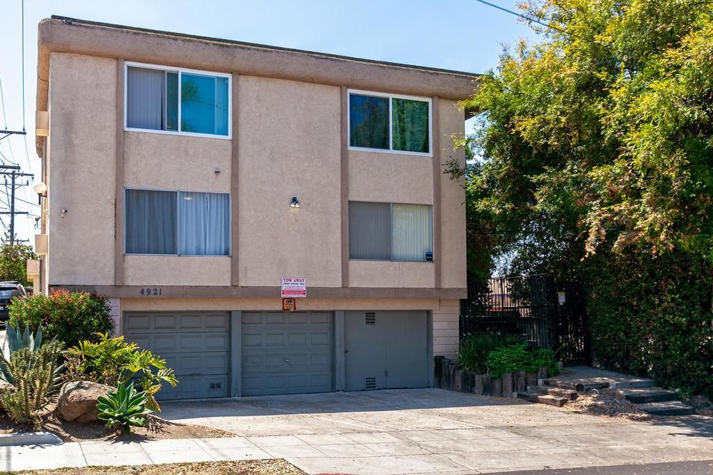 Welcome to 4921 Trojan! This one bedroom and one bath unit has it all! The location is close to all. You can go to Kensington or Talmadge to shop and eat. SDSU is very close as well as City Heights and North Park. As you enter this first floor condo, you will immediately notice the awesome condition of the unit including newer floors and paint. The large living room has plenty of light and a floor to ceiling window to add to the view. There is a ceiling fan and open floor plan to the kitchen. The kitchen has a bar where you can finish some work on the computer or drink your morning coffee. Above the entry way is a wall a/c unit and a circular window which adds more light. The kitchen has all of the modern appliances including a dishwasher. The bedroom has a full closet and newer floors. The bathroom The bathroom has been renovated with new countertops and newer toilet. The unit has 2 assigned alley parking spaces and a designated storage unit. This turn key unit is ready as an investment for rentals or as your primary residence. Come by and take a look!