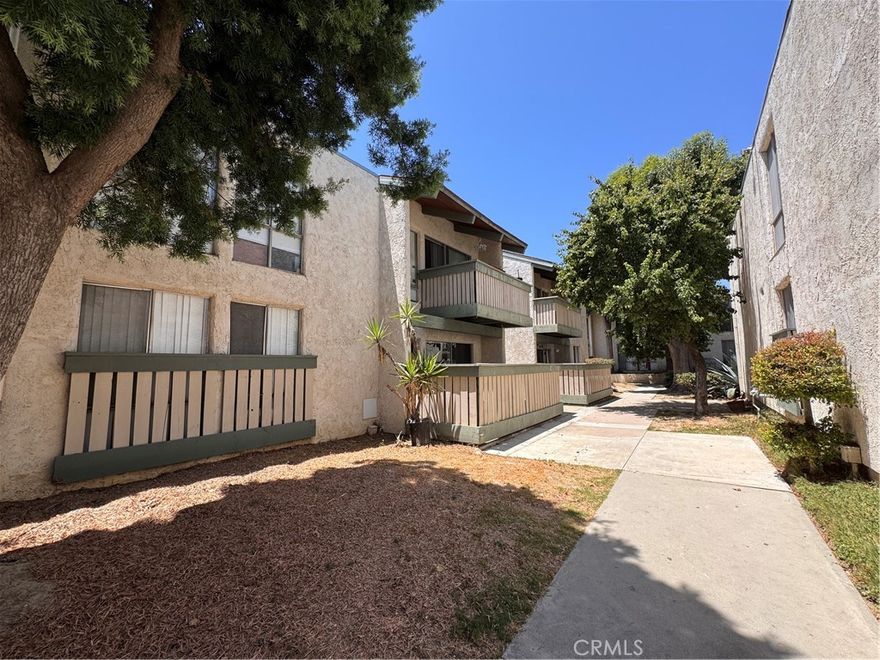 Welcome to this ground-floor condo in the desirable Village Park community, offering 3 bedrooms and 2 bathrooms with a spacious open floor plan. The updated kitchen features granite countertops, rich maple cabinetry, and tile flooring throughout most of the home. A large sliding glass door leads to an oversized private patio with views of the pool and spa—perfect for summer entertaining. The layout includes a primary suite with a full bath, plus two additional bedrooms sharing a second full bathroom. With great natural light and some room for cosmetic improvements, this home offers both comfort a