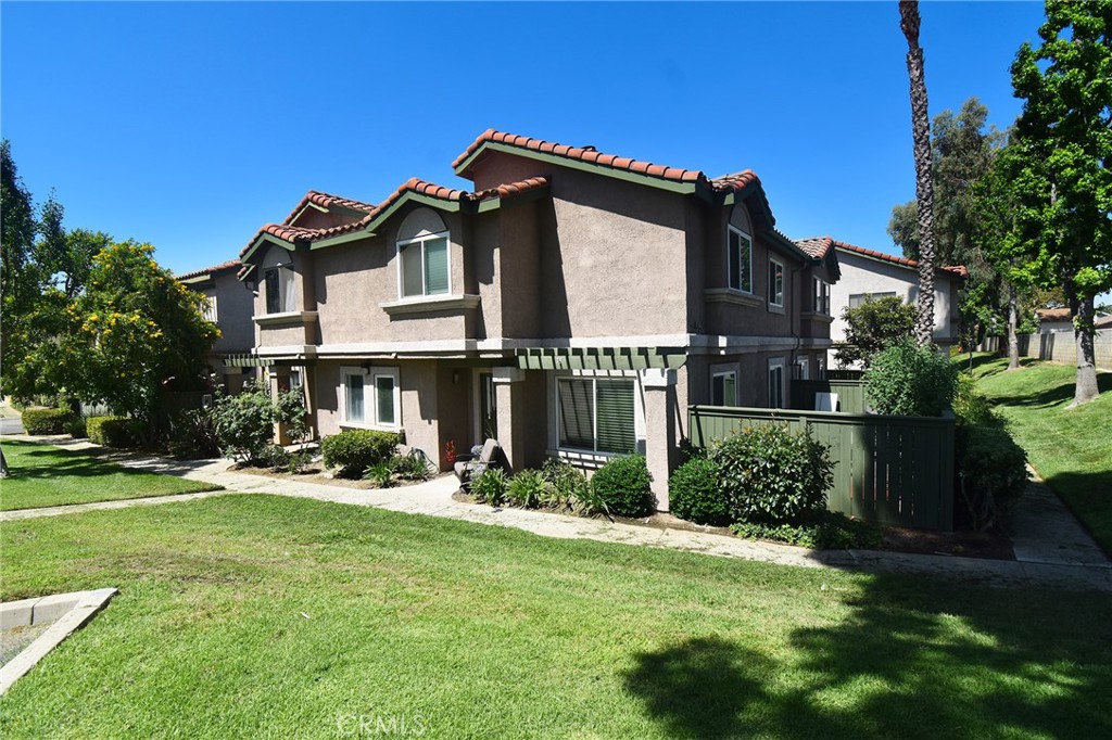 Priced to sell quickly. Best Value on the market today! This Adorable 2 bedroom condo located in the beautiful city of Rancho Cucamonga offering a vast array of dining, shopping, schools and community services! Meadow Wood Vilas is most sought after for its great community facilities including pools, spas and walking paths. Your new condo offers all of its living space above your hard to find two car attached garage with direct interior access. Because your living space above your own garage, you don’t have to worry about neighbors above or below you offering peace and quiet. The newer laminated flooring and brand new carpeting in bedrooms offers a clean slate for new owner to move in and make this condo your own! Living and dining room is open and adorns a Cozy fireplace Generous size bedrooms and nice size lanai brings this one to the top of Your showing list.