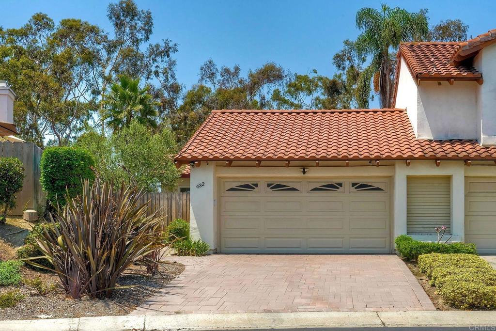 Welcome to this exquisite single-level twin home located in highly desirable Encinitas, nestled on a beautiful cul-de-sac street. This wonderful home offers the perfect balance of tranquility and convenience, making it an ideal retreat for those seeking a serene environment without sacrificing access to modern amenities. Every detail of this residence has been meticulously considered, both inside and out. There is tremendous curb appeal with Spanish-style architecture and a paver driveway. The private gated courtyard entry leads to a spacious backyard, featuring stunning drought-tolerant landscaping, landscape lighting, more elegant pavers, and a cozy fire pit. Inside, you will discover numerous upgrades, including a complete repiping of the home and the replacement of windows, including Anderson sliding doors that open from both the living room and primary bedroom. The thoughtfully designed finishes include a beautiful kitchen equipped with custom cabinetry, quartz countertops, stainless steel appliances, and a sliding door that leads to that gorgeous yard. The kitchen seamlessly connects to a generously sized dining and family room, with soaring vaulted ceilings and a welcoming fireplace. Both bathrooms have been tastefully updated with floating vanities. Tile flooring throughout, updated doors and hardware, smooth wall texture, interior laundry room, recessed lighting, and central A/C enhance the overall aesthetic. The primary bedroom features vaulted ceilings, a gorgeous ensuite bathroom, and a custom walk-in closet. Enjoy the relaxed Encinitas lifestyle conveniently situated near parks, highly rated Encinitas and San Dieguito schools, shopping, dining, and just minutes from the beach, freeway access, and downtown Encinitas. In essence, this home isn't just a place to live, it's a lifestyle to embrace. Welcome to your dream home in Encinitas, where every day feels like a vacation.