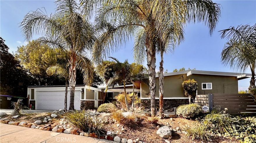 Welcome to this beautifully updated 4-bedroom, 2-bath single-family home in the desirable hills of Monterey Park, offering 1,962 sq. ft. of comfortable living space. The interior has been freshly painted and features an upgraded kitchen with quartz countertops, stainless steel appliances, a Viking cooktop, Thermador steamer, and a Sub-Zero refrigerator. Hardwood flooring runs throughout the home, complementing the remodeled bathrooms and modern finishes. Two separate living room areas provide ample space for entertaining or relaxing. The large, secluded primary suite sits on the opposite side of the home for added privacy and includes a walk-in closet and private bathroom. Step outside to a peaceful backyard with sweeping views of the surrounding Monterey Park hills—perfect for enjoying your morning coffee or evening sunsets.