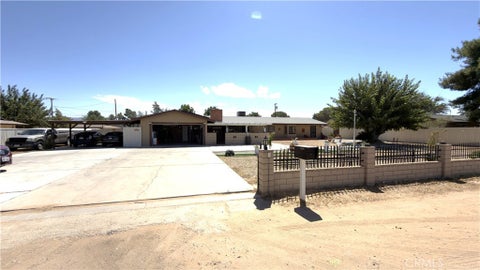 Photo of 13491 Iroquois RD, Apple Valley, CA 92308 (MLS # IG26195432)