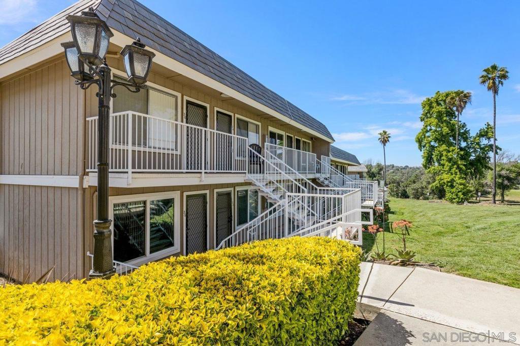 Highly Sought-After Lower Level End Unit 1-Bedroom Condo with No Stairs and Golf Course Views in Hidden Meadows! FHA and VA approved complex! This beautifully upgraded condo offers a spacious bedroom with plenty of storage, a cozy kitchen, and A/C to keep you comfortable. Enjoy views of the Boulder Oaks Golf Course from the front patio, with the added convenience of community laundry on-site. Optional $396/year fee grants access to the Hidden Meadows Community Pool and Tennis Courts. Just minutes from the 15 Fwy, shopping, and CSUSM, this condo perfectly balances peaceful living with easy access to everything you need.