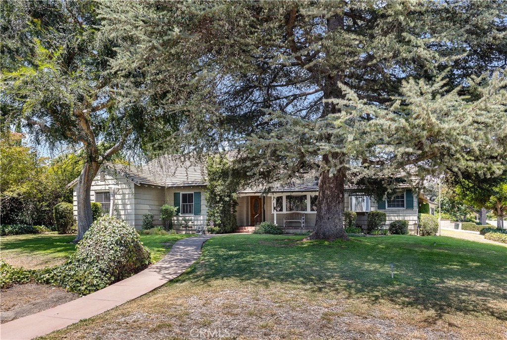 Highly desirable SINGLE level home in the prestigious Lower Rancho area of Arcadia, location, location!!! First time on the market in 50 years. South Facing 13,760 square foot corner lot, 3 Bedrooms 3 baths plus a den/office w/adjoining bar could be 4th bedroom, 2 Car attached garage w/stone driveway. Spacious family room with vaulted wood beam ceilings, fireplace and glass doors leading to the pool, built in book cases and wet bar. Formal dining room with wood floors. Oversized living room with fireplace and sliding glass doors leading to the pool. Primary bedroom with makeup desk and adjoining bath. Kitchen w/tile counters, oak cabinets, wood floors, built in refrigerator. Lush back yard with oversized sparkling pool and extra large patio cover. Tile roof, central air, Laundry room in kitchen, There is no furniture in the home, photos are virtual staging