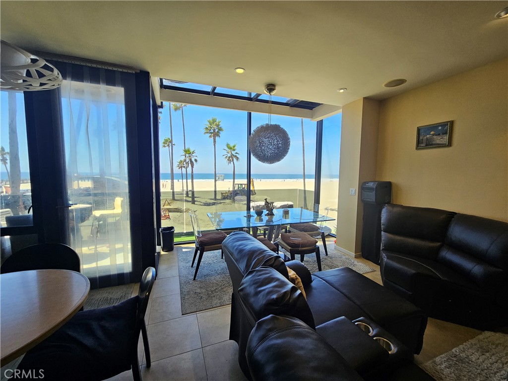 Wake up to the breathtaking views of the Pacific Ocean from the Santa Monica Mountains all the way to the Marina Coast! This beautifully modern built multi-level townhouse located on the beach is the ideal home for those seeking a respite from the complications of day-to-day life in Los Angeles! Large living room with views of the ocean and adjacent kitchen equipped with built-in appliances, such as Miele coffee maker, microwave oven, stove and oven and multiple wine coolers create an open, welcoming space for you and your guests. White Italian marble floors in the living room, guest bedroom and the kitchen with a large balcony facing the ocean on the first floor and the second floor consists of the master bedroom/bathroom and third bedroom both overlooking magnificent views of the beach. Master bathroom is large with a balcony facing the ocean and a hot tub and steam bath with magnificent views of the beach. The unit is located in a two-unit complex and has exclusive access to one garage parking space and a shared guest parking space. Laundry facilities located on the first floor next to the garage. Shared roof deck has 360 degree views of the ocean and the city and is simply breathtaking!