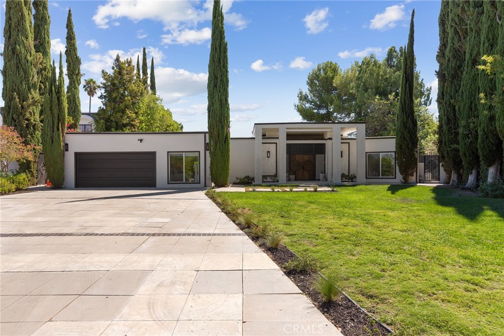 First time on the market in over 30 years! Tucked at the end of a prestigious Encino Hills cul-de-sac, this extraordinary 4 bed, 3 bath estate has been reimagined with ultra-luxury finishes, soaring ceilings, and a seamless open floor plan that frames jaw-dropping unobstructed canyon and city views. Positioned on one of the largest usable lots the area has offered in years, the home boasts impressive frontage, designer interiors, top of the line Calcutta and Travertine and effortless indoor-outdoor flow. A rare combination of privacy, scale, and sophistication—just minutes from the Westside and the heart of Encino—this residence sets a new standard for high-end living in the Hills.
All information provided regarding this property is deemed reliable but is not guaranteed. Neither the Seller nor the Listing Agent makes any representations or warranties, expressed or implied, regarding the accuracy, validity, or completeness of any statements, whether verbal or written.