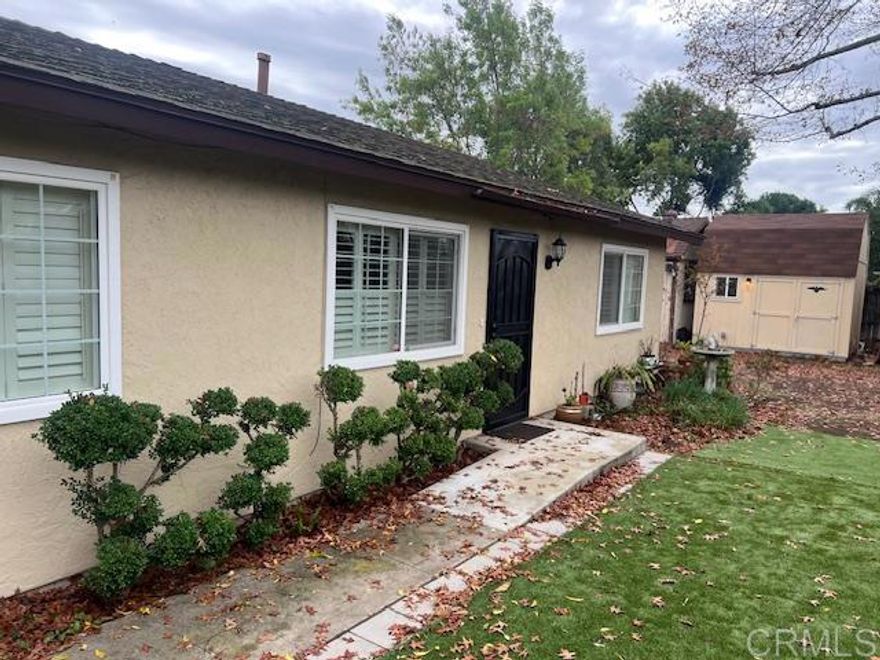 Discover this charming 3-bedroom, 2-bath home offering 1,148 sq. ft. of comfortable living space in a quiet Escondido neighborhood. The home features thoughtful interior upgrades, including a beautifully remodeled kitchen (2020), rich cherry wood flooring, fresh interior paint, updated windows, and a new electrical panel installed in 2024. The exterior received a full repaint in 2023, giving the home excellent curb appeal.  Step outside to a spacious backyard with mature trees, multiple fruit trees, and storage sheds, creating the perfect setting for gardening, projects, or extra storage. Located close to local schools, parks (Daley Ranch and Lake Dixon), and amenities, this home combines convenience with comfort. Move-in ready and well-maintained.