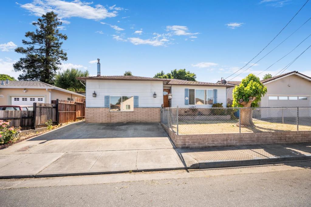 Welcome to 921 Suiter St a 4-bedroom, 2-bathroom home offering approximately 1,672 square feet of comfortable living space on a generous approximately 5,001 square foot lot. Perfectly located near the heart of Downtown Hollister, this property offers easy access to local restaurants, boutique shops, and the vibrant weekly farmers market. Step inside to find a spacious and functional layout ideal for both everyday living and entertaining. The kitchen flows seamlessly to a large covered patioperfect for outdoor dining, weekend barbecues, or simply enjoying your private backyard retreat year-round. Additional highlights include a paid-off owned solar system, providing energy efficiency and long-term savings, and a low-maintenance lot that offers space for gardening, pets, or play. Dont miss this opportunity to own a home in one of Hollisters most convenient and charming neighborhoods. Schedule your private showing today!