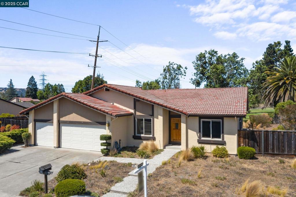 Opportunity knocks with this single-story home on a flat 1/3-acre lot backing to San Ramon Golf Club. The home boasts formal living and dining rooms with a cathedral ceiling. A kitchen with wet bar open to the family room with a vaulted ceiling. The office with double door entry and wet bar can serve as a fourth bedroom. The primary suite has vaulted ceilings, dual closets, backyard access and a large bathroom with dual sinks, sunken tub/shower combo and private water closet. Skylights in the hall, bathroom, and laundry room add natural light. Multiple sliding glass doors connect living, family, and primary bedroom to the backyard. There is a three car garage and RV/boat access. This home is an opportunity to buy below market in a very desirable San Ramon neighborhood, update to your taste, and unlock the home’s full potential. Minutes to top-rated secondary schools and 680 access. Southeast-facing front entry.