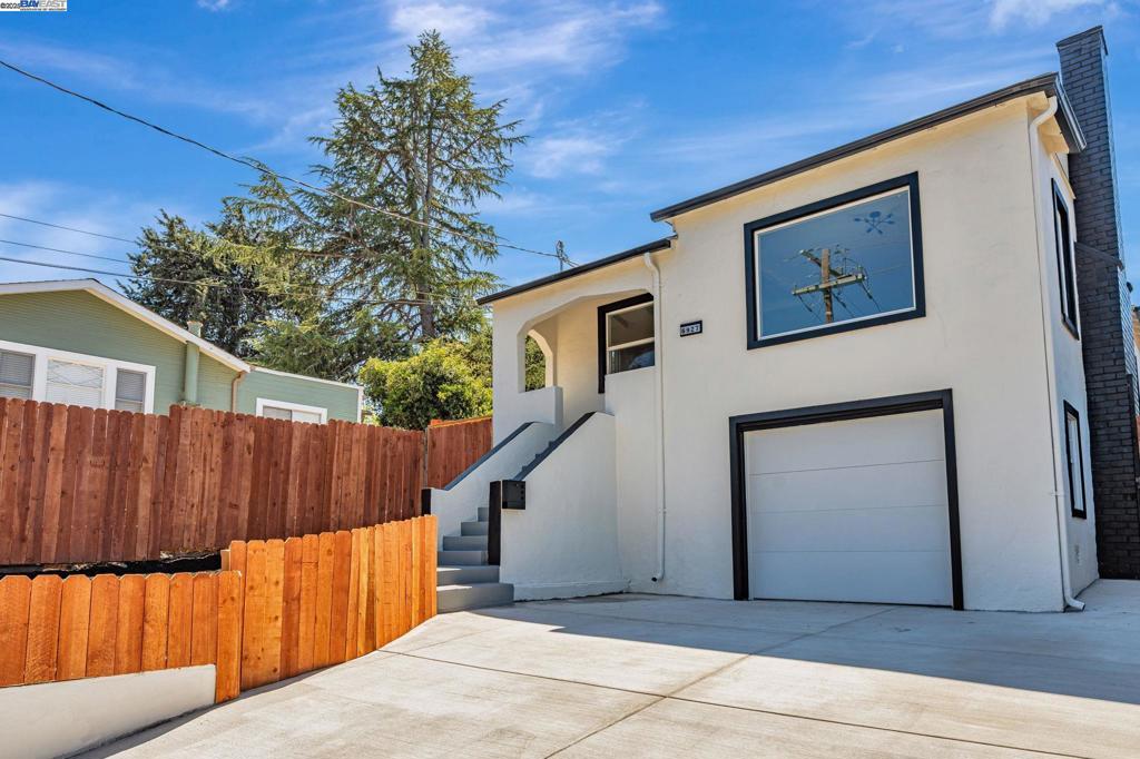 Look no further for your next home! Nestled in the desirable Leona Hills neighborhood, this fully remodeled 4-bedroom, 2-bath residence offers the perfect blend of style, comfort, and convenience. Step inside to discover an inviting open-concept kitchen with sleek cabinetry, modern finishes, and a seamless flow into the living and dining areas—ideal for both daily living and entertaining. The spacious bathrooms have been thoughtfully updated with contemporary touches, creating a spa-like atmosphere. From the front yard, enjoy sweeping views of the Oakland Hills, while the backyard transforms into a private oasis with a quiet, resort-style ambiance—perfect for relaxation or hosting gatherings. Set on a large lot, this home provides plenty of room for outdoor enjoyment and future possibilities, including the potential for an ADU or additional expansions (buyer to verify). Conveniently located near major freeways, schools, and bus stops, commuting and daily errands are a breeze. Enjoy the peace of a residential neighborhood while staying just approx. 15 minutes from the vibrant energy of Oakland’s dining, shopping, and entertainment. With its prime location, modern upgrades, stunning hillside views, and tranquil backyard retreat, this home offers the lifestyle and flexibility.