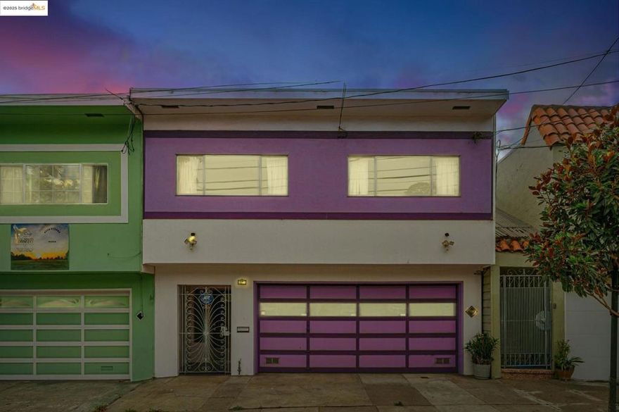 Open House Sunday 9/28 & 10/5, from 2-4:00pm. BAYVIEW SWEET! With a complete unobstructed view of the Hills and the Bay.  You'll be comfortable in the 3 bedrooms and 2 bathrooms in this home with an extra over-sized, flexible room that just about spans the width of the house.  On the upper level the largest bedroom has its own walk-in closet that connects to a private bathroom with a skylight where the sunlight rolls right in.  The garage can house 2-cars on top of having more area for creating, tinkering, painting; whatever you're in to.  The basement space beneath the house is plentiful and superb for storing items.  There's a mature walnut tree in the backyard with generous yard space for hosting a BBQ or cookout, playing cards/board games and planting flowers, vegetables or herbs.  Quickly be downtown with a short brisk walk to Third St. light rail.  Come check it out and make 1143 Palou YOUR home!