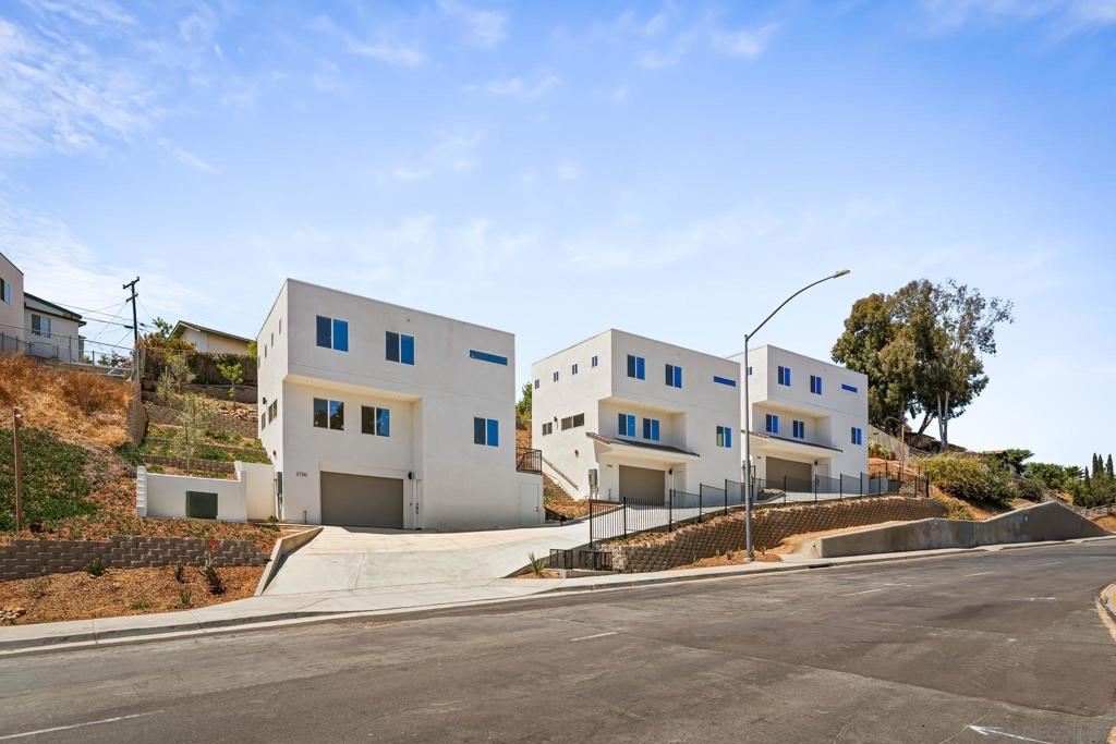 Rare opportunity to acquire three brand-new construction homes on separate parcels, offered together as a single investment in the highly desirable Paradise Hills neighborhood of San Diego. Each 3-bedroom, 2.5-bathroom residence is equipped with paid solar and designed with modern, low-maintenance finishes, reducing operating costs and creating long-term durability. The open-concept layouts, abundant natural light, and hillside views make these homes highly attractive to today’s renters, while attached garages and private outdoor space further enhance tenant demand. With three separate APNs, investors gain the flexibility of selling individually in the future while enjoying the immediate benefits of stable rental income across multiple units. The central Paradise Hills location provides quick freeway access, a short drive to downtown San Diego, and close proximity to major employment hubs, shopping, golf, and outdoor recreation—all key drivers of strong tenant demand. This is a unique chance to secure three turn-key, income-producing assets with built-in energy efficiency and long-term appreciation potential in one of San Diego’s solid rental submarkets.