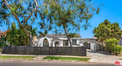 Photo of 8906 S Harvard Boulevard, Los Angeles, CA 90047 (MLS # 26874269)