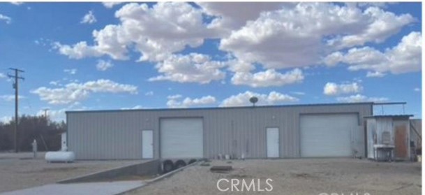 This extraordinary property offers an exceptional opportunity for a mixed-use residential and industrial development. Situated on a sprawling 10-acre land, the property boasts a warehouse with 3,300 square footage, providing ample space for various purposes.
The warehouse features a versatile layout, ideal for accommodating both residential and industrial needs. With its expansive size, it offers endless possibilities for customization and utilization. The property is conveniently located just minutes away from the 15 freeway, ensuring easy access and excellent connectivity.
One of the notable features of this property is the presence of two water wells, which provide a reliable and independent water source. This is particularly advantageous for industrial operations, agriculture, or any other water-intensive activities.
The mixed-use possibilities for this property are vast. You can explore options such as establishing a storage and distribution center, manufacturing facility, or event venue within the warehouse. Additionally, there is an opportunity to develop residential units, creating a vibrant community in conjunction with commercial and industrial activities.
The expansive land area opens avenues for further development, including the potential for agricultural activities, such as farming or greenhouse cultivation.
Overall, this property presents an amazing investment opportunity, with its strategic location, versatile warehouse space, independent water supply, and extensive land area. Whether you envision a thriving industrial hub, a residential community, or a combination of both, the possibilities are truly endless.