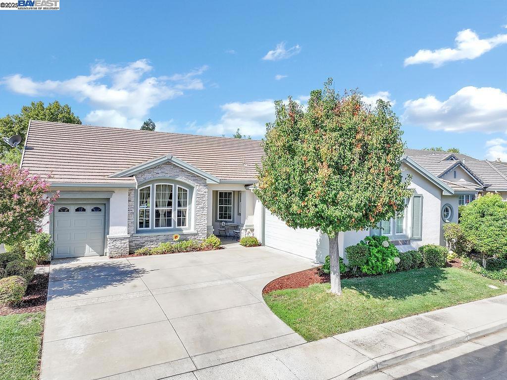 LOCATED IN DESIRABLE SUMMERSET 3 - A VIBRANT +55 ACTIVE ADULT COMMUNITY NESTLED IN NORTHERN CALIFORNIA'S SENIC TRI-VALLEY -RUTHERFORD MODEL WITH GOLF COURSE VIEWS OFFERS 3 BEDROOMS (3RD BEDROOM/HOME OFFICE) 2.5 BATHS WITH 2222 SQ FT OF LIVING - This resort style gated community offers low HOA dues - Amenities include: Security gate, Pool, Spa, Gym, Billiard room, library, Bocce ball, Lighted tennis courts, and more! Open concept living with spacious great room, high ceilings & 2-way fireplace - Chef's kitchen w/Corian counters, eat at bar, newer gas stove & casual dining area - Formal dining room - Primary Suite w/golf course view, double vanities, spa like soaking tub, separate shower & walk in closet - Secondary ensuite guest bedroom with full bath -Mud room off garage/pantry w/built in desk/Tech Station - Entertainers backyard w/covered patio area & electronic sunshades - 2 car garage plus golf cart garage - Steps away from Pool & Clubhouse - Additional guest parking close by - All this and more...