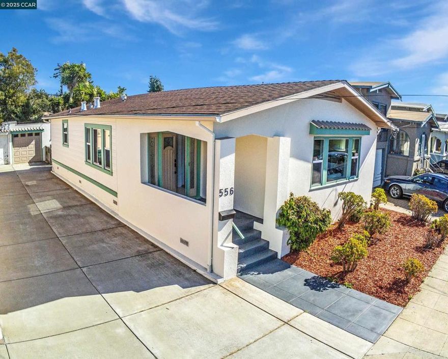 Just in time for the holidays, discover this timeless Craftsman at 556 41st Street, a perfect blend of classic character with modern style. Sunlight pours through the large picture window of the formal living room, highlighting refinished hardwood floors, built ins and a beautiful fireplace ideal for cozy gatherings. Recessed lighting and wall sconces create warm ambiance for any mood. The formal dining room flows from the living room for holiday dinners, brunch with friends or quiet mornings with coffee. The updated kitchen has a pantry, barn doors, NEW appliances, a sitting nook and room for a rolling island, if you desire. The renovated bathroom features a glass enclosed spa style shower with built in seating, glass enclosure, & honeycomb tile. A true laundry room with a sink leads to a flexible bonus room that works as an office or third bedroom or both. Mature trees provide privacy in the backyard and the garage sits at the rear of the property with direct yard access - a great storage or flex space option. Close to schools, restaurants, shopping, BART, I580/80. Charming, inviting and full of light, this home is ready to welcome you for the season!